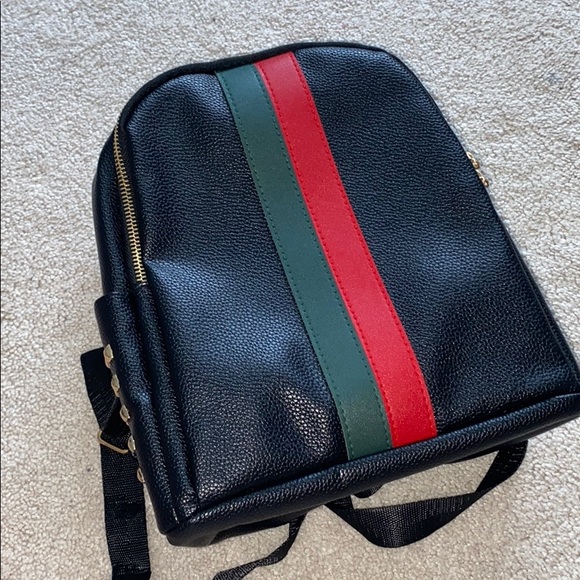 black gucci backpack with red and green strap